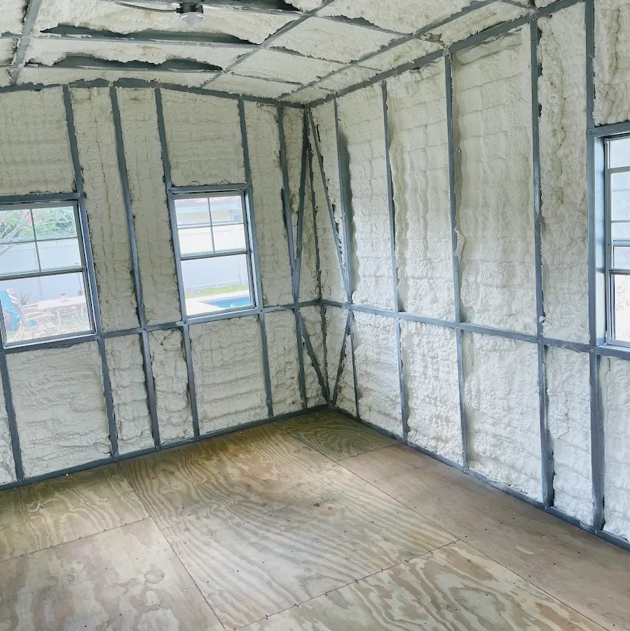 Closed-cell spray foam insulation applied to wall cavities in a residential project in Helotes